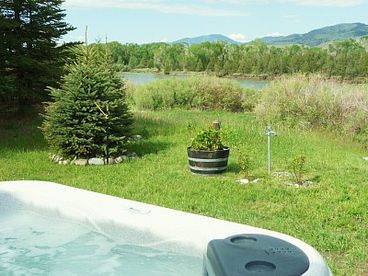 Enjoy your own riverside hot tub
