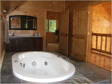 Relax in the master suite with large, garden tub