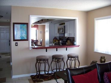 Newly remodeled Kitchen and Dining. From the dining table you can view inner coastal water and the Gulf of Mexico
