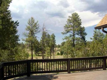 Large back deck with golf course view.