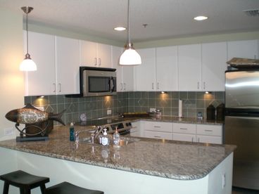 Kitchen with Granite countertops and stainless steel appliances