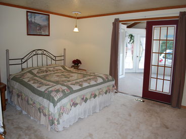 Master bedroom opening into solarium with private hot-tub.