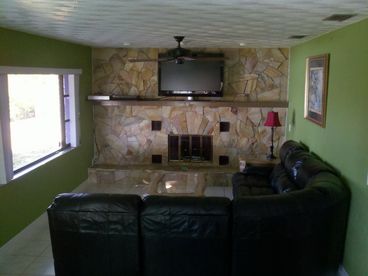 FAMILY ROOM WITH FIREPLACE AND 47INCH HD TV