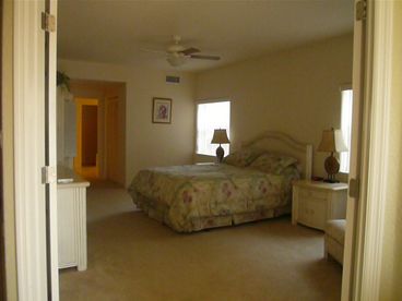 Master bedroom is 19 x 15, Very Large. Has patio door to wraparound balcony, TV and furniture has stone tops.