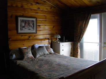 2 Bedroom Executive Log Home with 16 x 32 Heated Pool and Hot tub