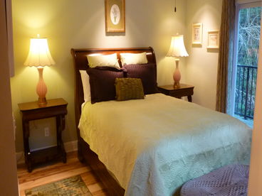 Queen Bedroom has own bathroom with slipper claw-foot tub.