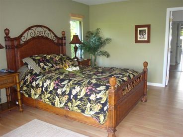 Master bedroom with lanai and outdoor shower in Kauai Vacation Rental