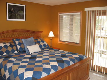 Eagle\'s Nest master bedroom, like all the master bedrooms, offers sliding door access to your own private balcony or patio. It can also be accessed from the living room.