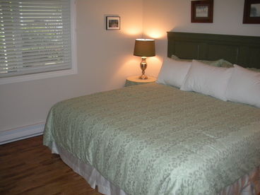 Master Bedroom - King Bed, in a tastefully decorated room off the main hallway- with a 32\