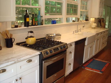 Stainless appliances and marble counters