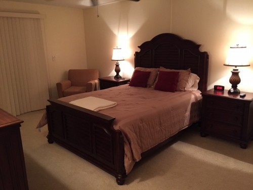 Queen Bed, night stands, dresser with mirror and accent chair. New oversized accent chair with single pull-out bed to be added this season. Room also has 22\