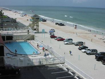 Ocean view with large pool and sun deck.