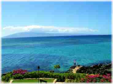 A shot of our grounds, the sealadder, and the Island of Lanai off in the distance. You also have an unbelievable view of BOTH islands (Lanai and Molokai) from our balcony!