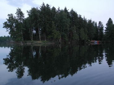 out on the boat, taking a picture of the peninsula