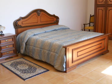 Master bedroom has a queen bed, panoramic views of the village and a 26 in. LG flatscreen TV.