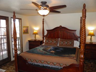 King master bedroom with French Doors leading onto private deck/balcony.