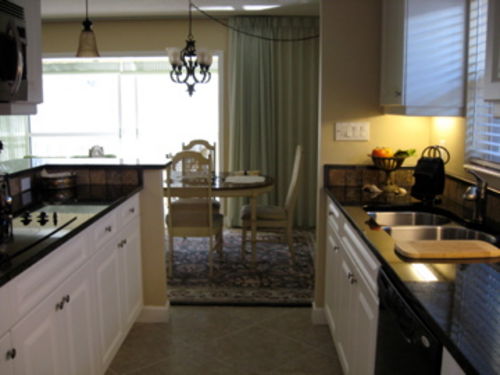 Granite counter top, new cupboards and appliances.