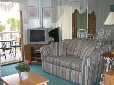 Livingroom Furnished With Queen Sofa Sleeper And Love Seat