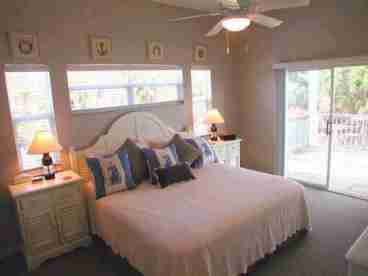 Master Bedroom with private bathroom and private screen porch