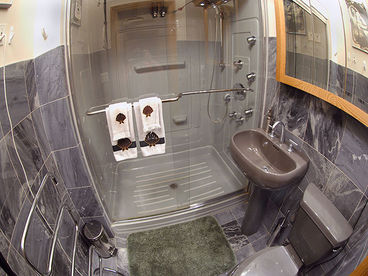 Our Huge 5 Foot by 3.5 Foot shower with Grohe Body Sprays and Steambath Generator
