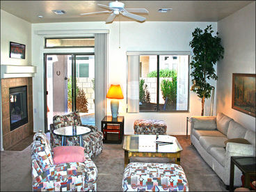 The Living Room and Patio as seen from the Kitchen.