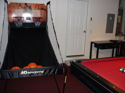 private games room with pool table, basketball, & other games.
