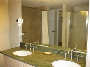 New double sink marble vanity in a totally remodeled master bath.