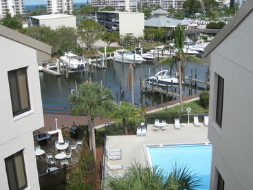 View the canal,manatees and the gulf from the second floor open-air lanai.