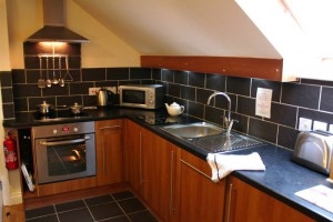 The kitchen in Laura\'s Loft has intergrated appliances including oven, ceramic hob, dishwasher, fridge/freezer and microwave oven.  It has plenty of work surfaces for the preperation of meals