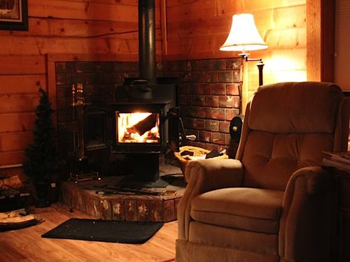 Dual recliners, wood burner stove