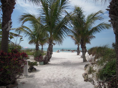 Walk through the lush gardens on your way to your private beach on the Gulf.