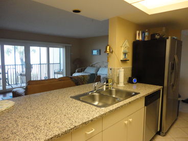 Granite countertops. Look out over the Gulf while in the kitchen, dining and living room