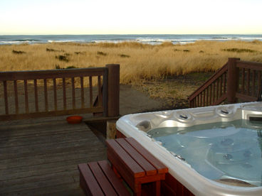 Large west facing deck and recessed covered large hot tub