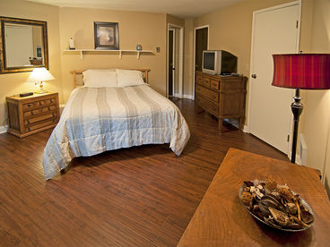 Master bedroom with adjacent sleeping den with futon.