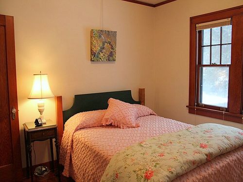 Bedroom on main level with queen bed.