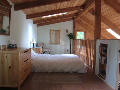 Loft Bedroom with opening skylights and ocean glimpses