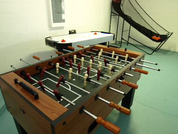 Game room in this vacation home, for rent through Discount Vacation Rentals Online