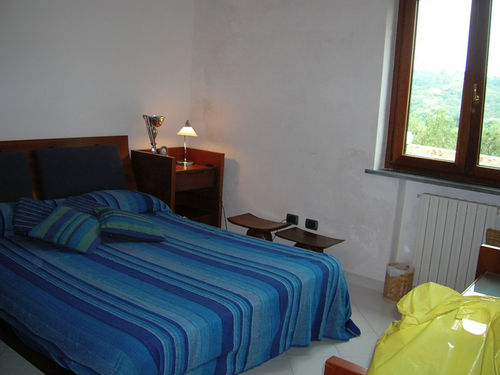 bedroom with air conditioning at villa located in Amalfi coast with private pool, outside showe and Amazing Isle of Capri view