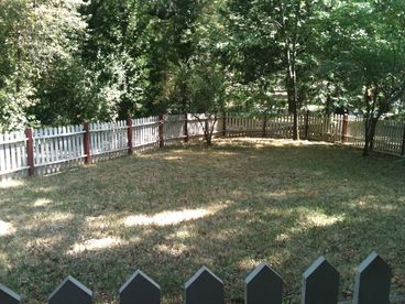 Fenced yard for your pets and children.