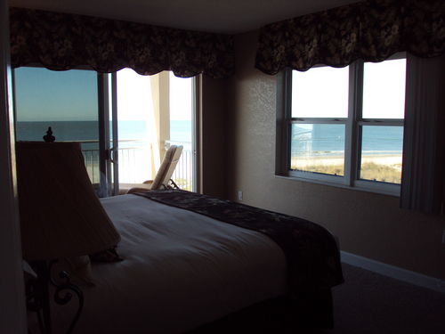 Master has plush luxury linens and fireplace to enjoy the unobstructed views of the beach