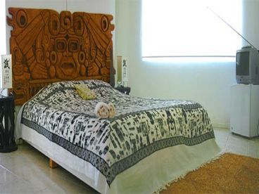 A large and spacious room located on the second floor level of Villa Alba. Originally the master bedroom of the villa, this sunlit, white washed studio offers a private balcony with views upon Lozenets village and the Black Sea Coast area, and window overlooking the Stranja Mountains.It also features a king-sized intricately carved wooden bed, a walk-in wardrobe, TV set, mini-bar and a bathroom with shower. Feather bed netting is provided for out of season months.