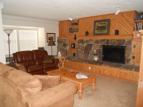 Living room - queen sofa sleeper, dual leather recliner, gas fireplace, flat screen TV