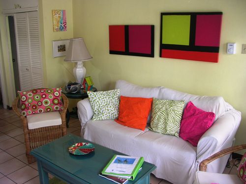 The sofa in the living area folds out to a double bed for extra guests. The closet at left has a lockable safe, iron, ironing board, blow dryer, laundry drying rack and swim boards.