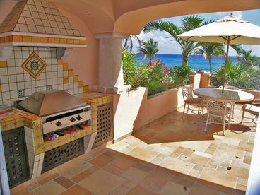 Amazing, large oceanfront terrace with professional barbeque, chaise lounges, dining tables and incredible VIEW