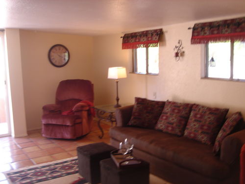 Living room with Direct TV included in price