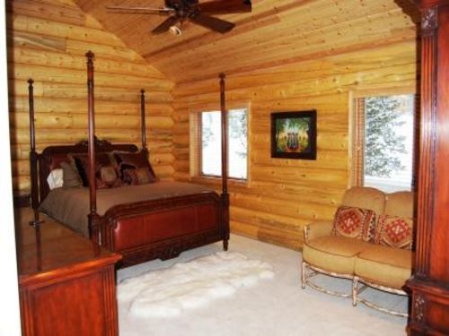 master suite has king bed, jacuzzi tub, walk in shower with 3 heads