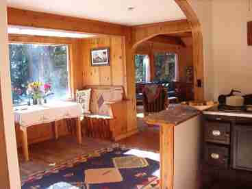 The cottage offers rich old beaded board pine paneling thoughout the front rooms.