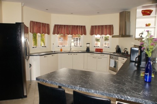 A spacious kitchen with lots of natural light