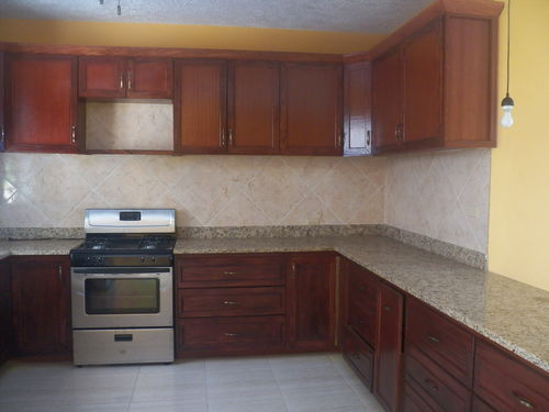 Totally new cabinets, granite countertops, stove and refirgerator.