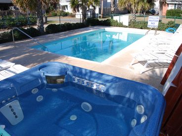 Swimming pool with hot tub